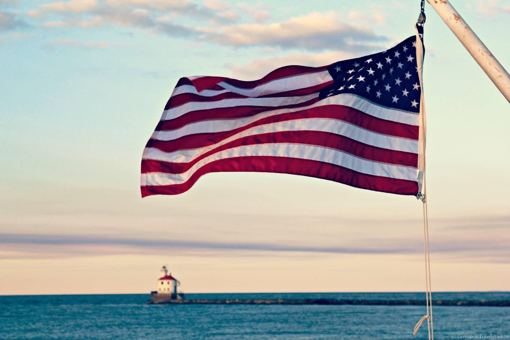Wisconsin Point Lighthouse and American Flag Vista Fleet Sunset Dinner Cruise