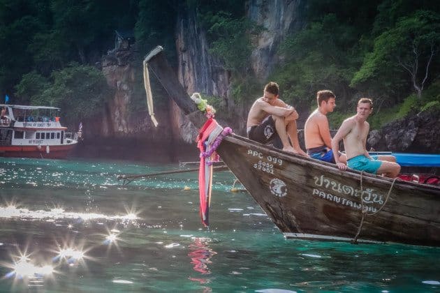 Long Tail Boat and Tourists in South Thailand Photos