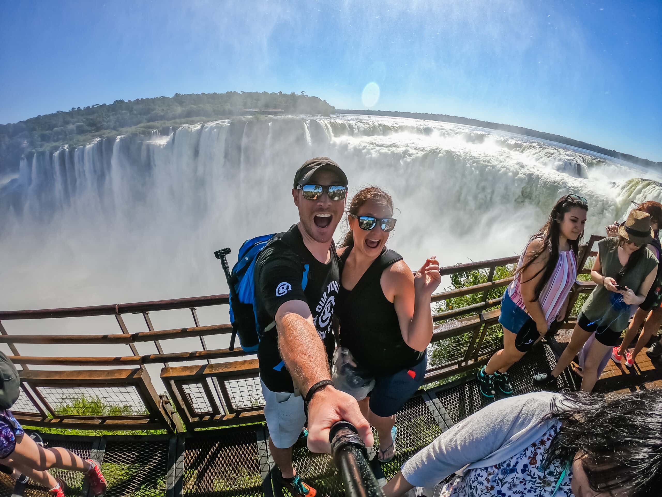 Lina & David Stock (Divergent Travelers) at Iguazu Falls